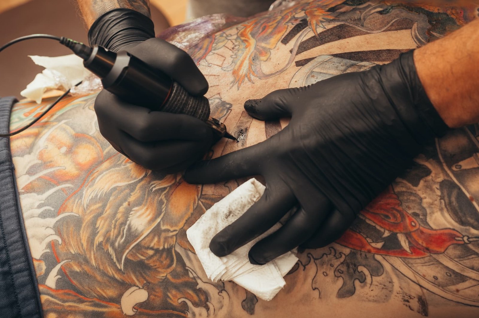 Close up of the tattoo machine. Tattooing.